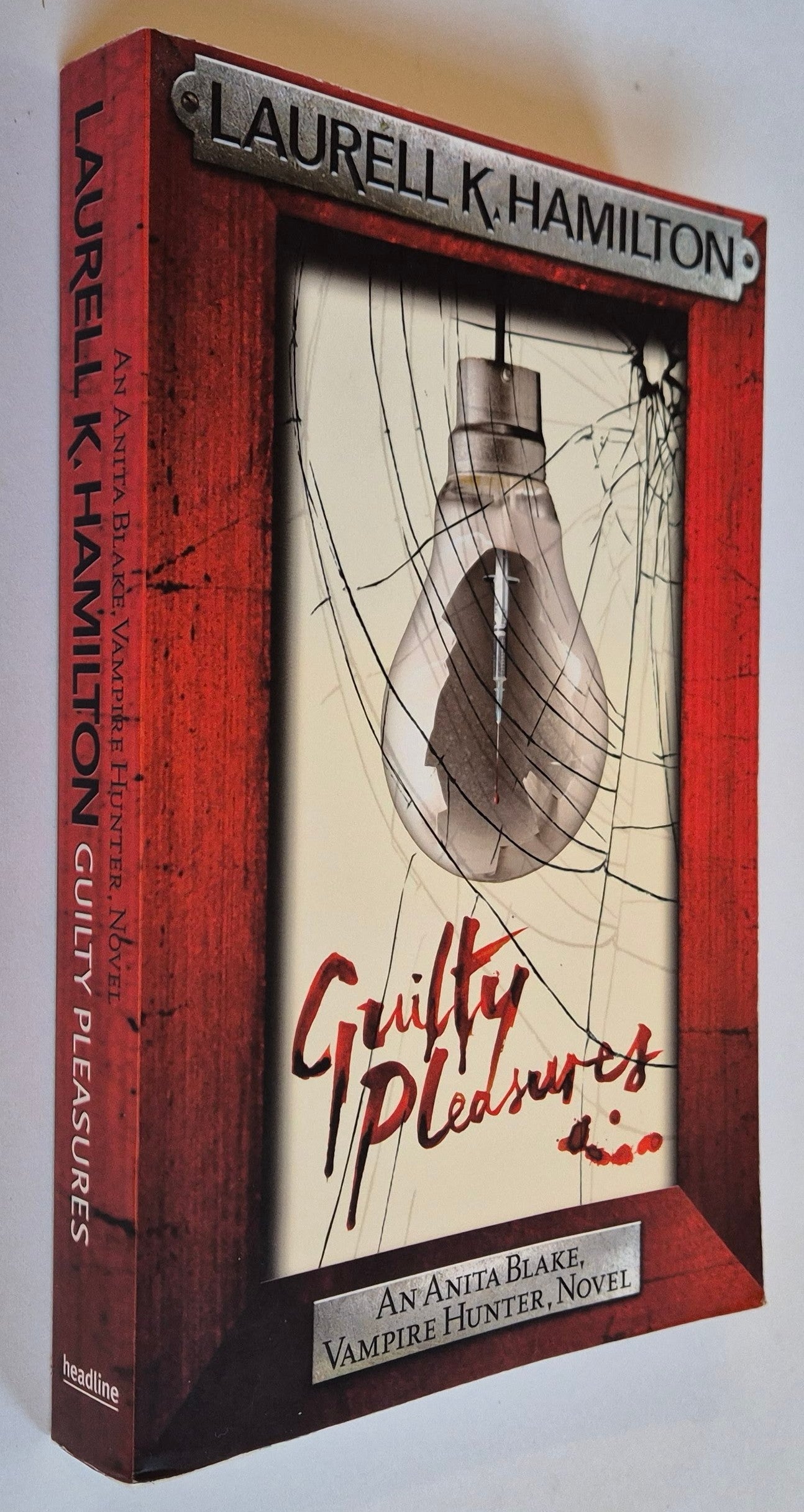 Guilty Pleasures (Anita Blake Vampire Hunter #1) by Laurell K. Hamilton