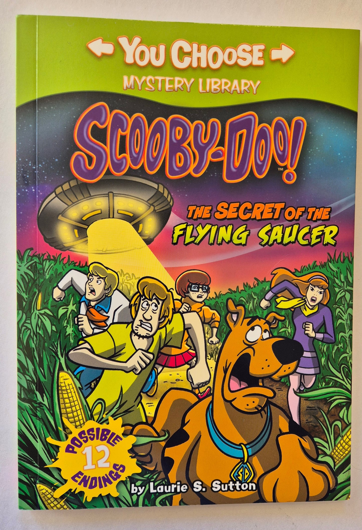 The Secret of the Flying Saucer (You Choose: Scooby-Doo) by Laurie S. Sutton