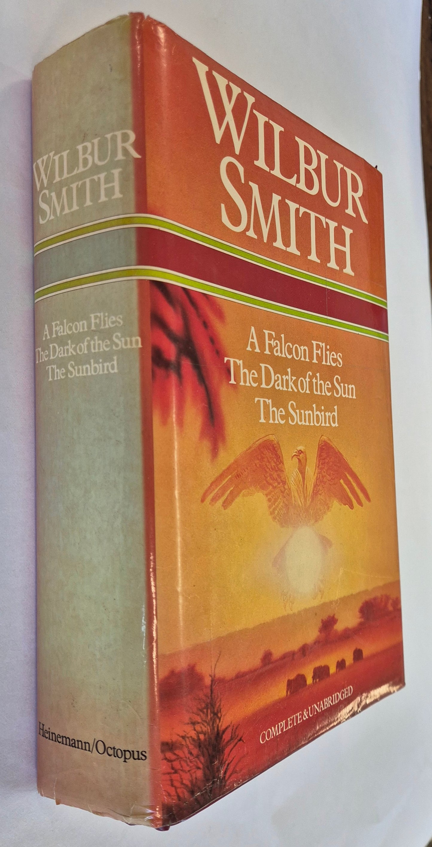 A Falcon Flies (Ballantyne #1) + The Dark of the Sun + The Sunbird by Wilbur Smith