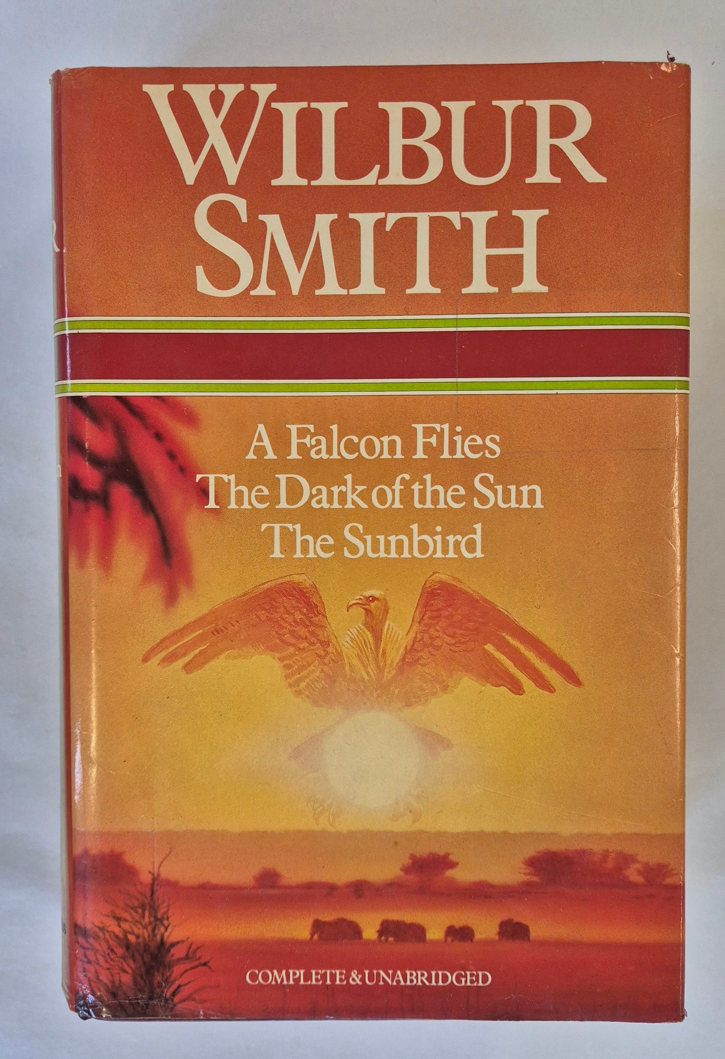 A Falcon Flies (Ballantyne #1) + The Dark of the Sun + The Sunbird by Wilbur Smith