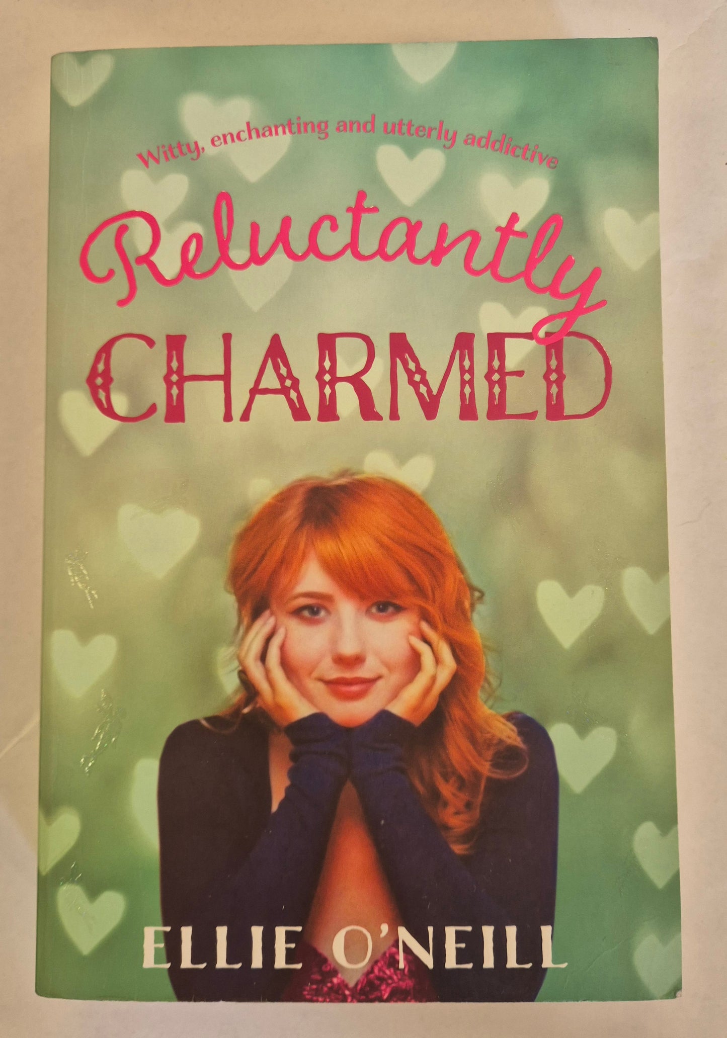 Reluctantly Charmed by Ellio O'Neill