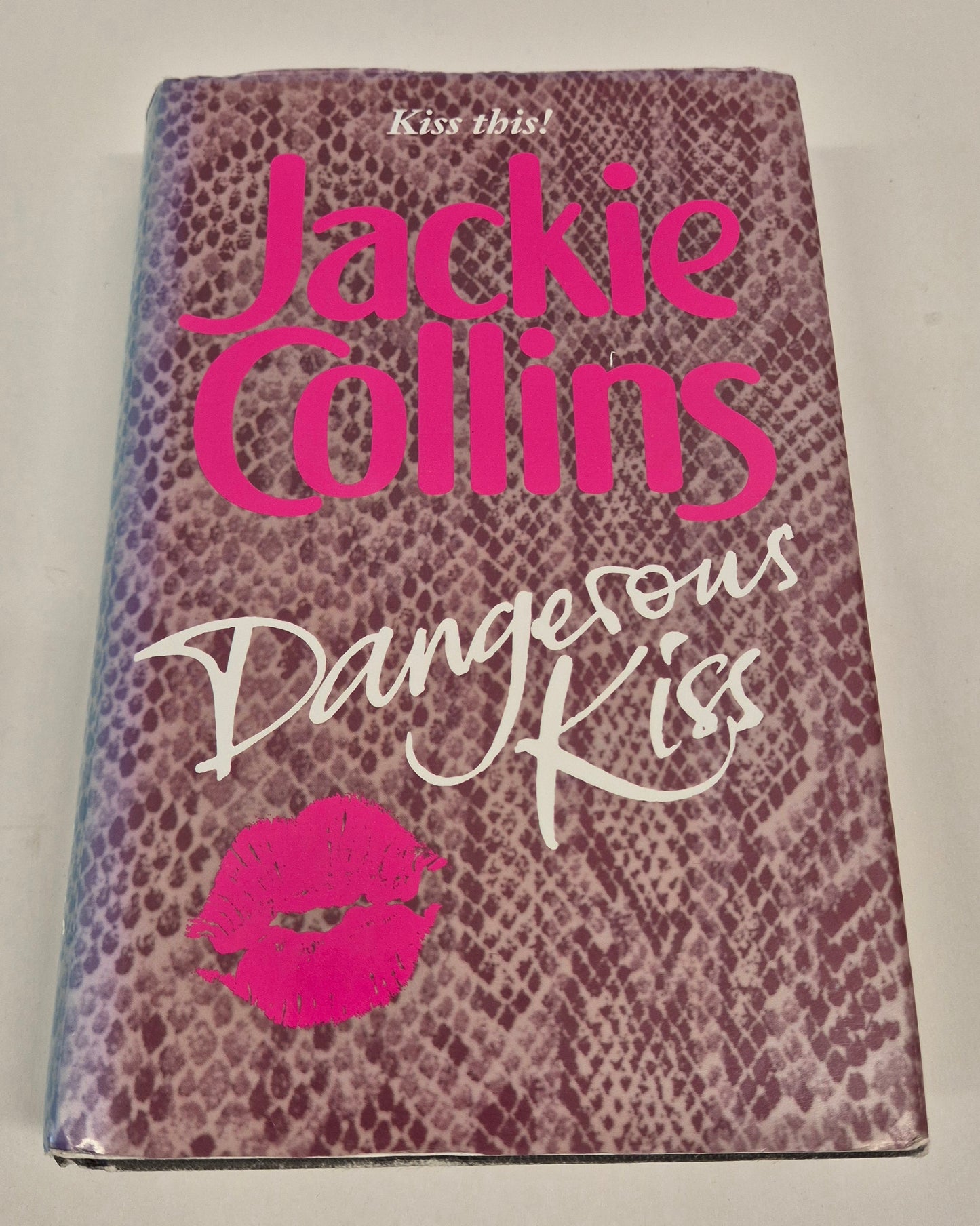 Dangerous Kiss (Lucky Santangelo #5) by Jackie Collins