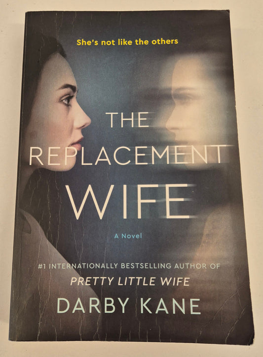 The Replacement Wife by (HelenKay Dimon Writing as) Darby Kane