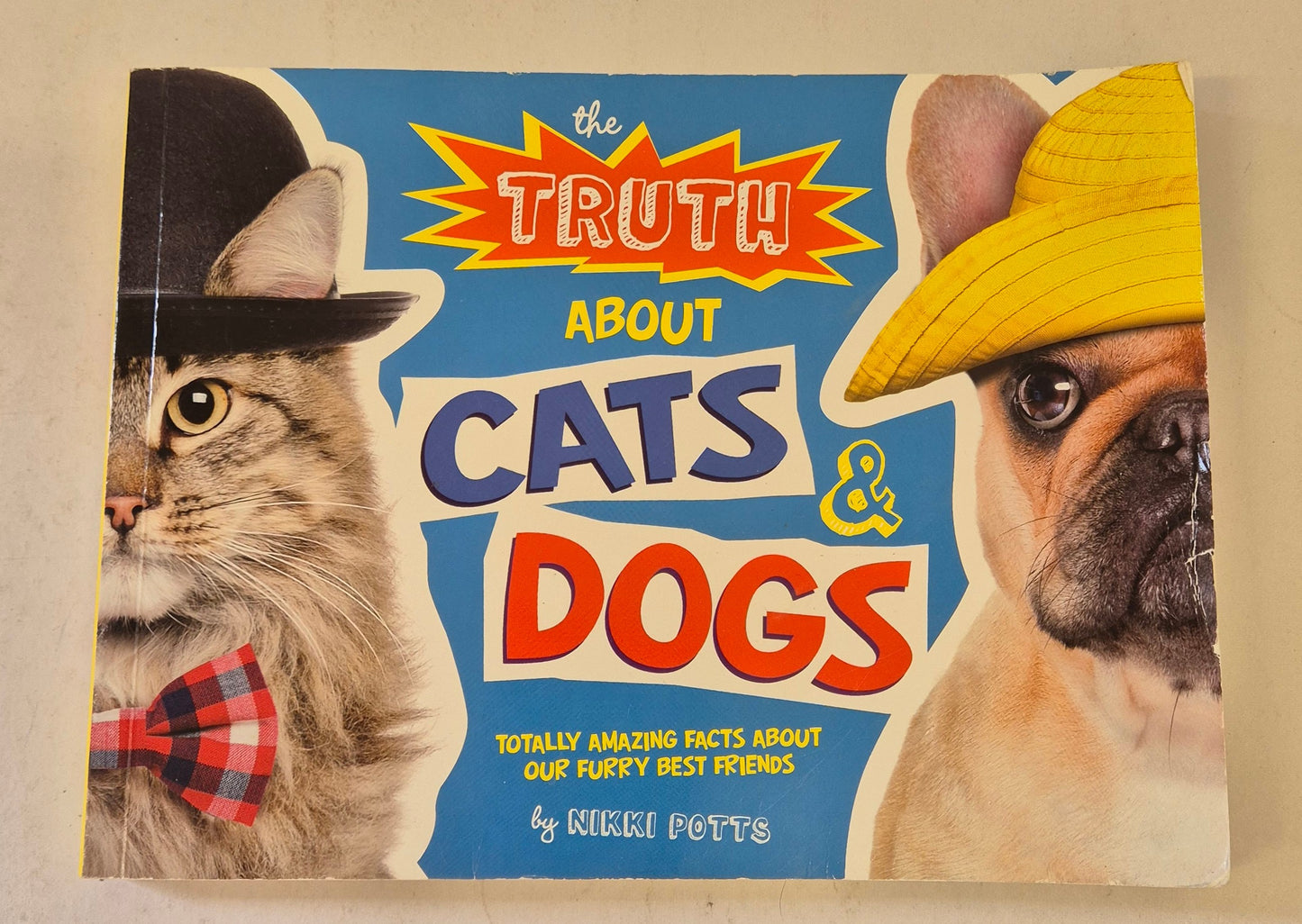 The Truth About Cats & Dogs: Totally Amazing Facts About Our Furry Best Friends by Nikki Potts