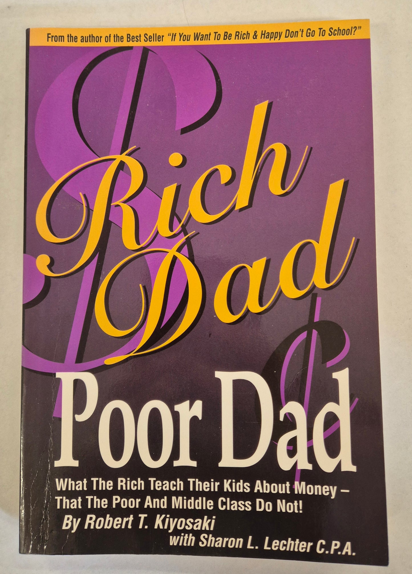 Rich Dad, Poor Dad (Rich Dad #1) by Robert T. Kiyosaki