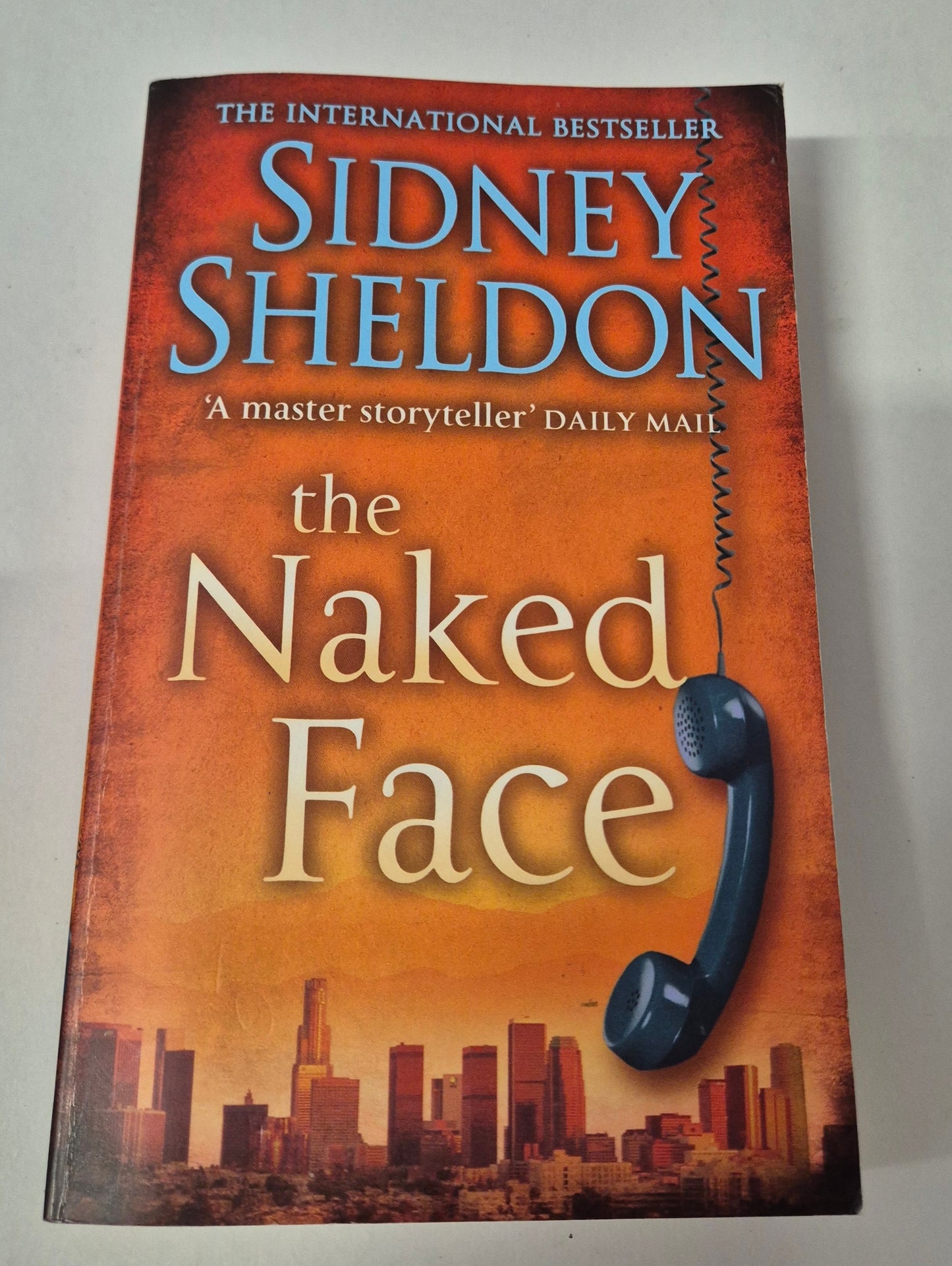 The Naked Face by Sidney Sheldon