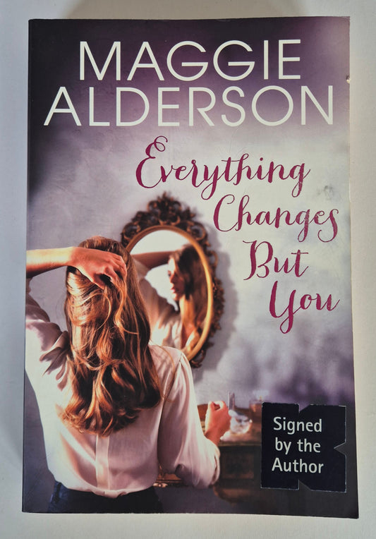 Book cover of 'Everything Changes But You' by Maggie Alderson with a woman looking into a mirror. Secondhand Book Australia