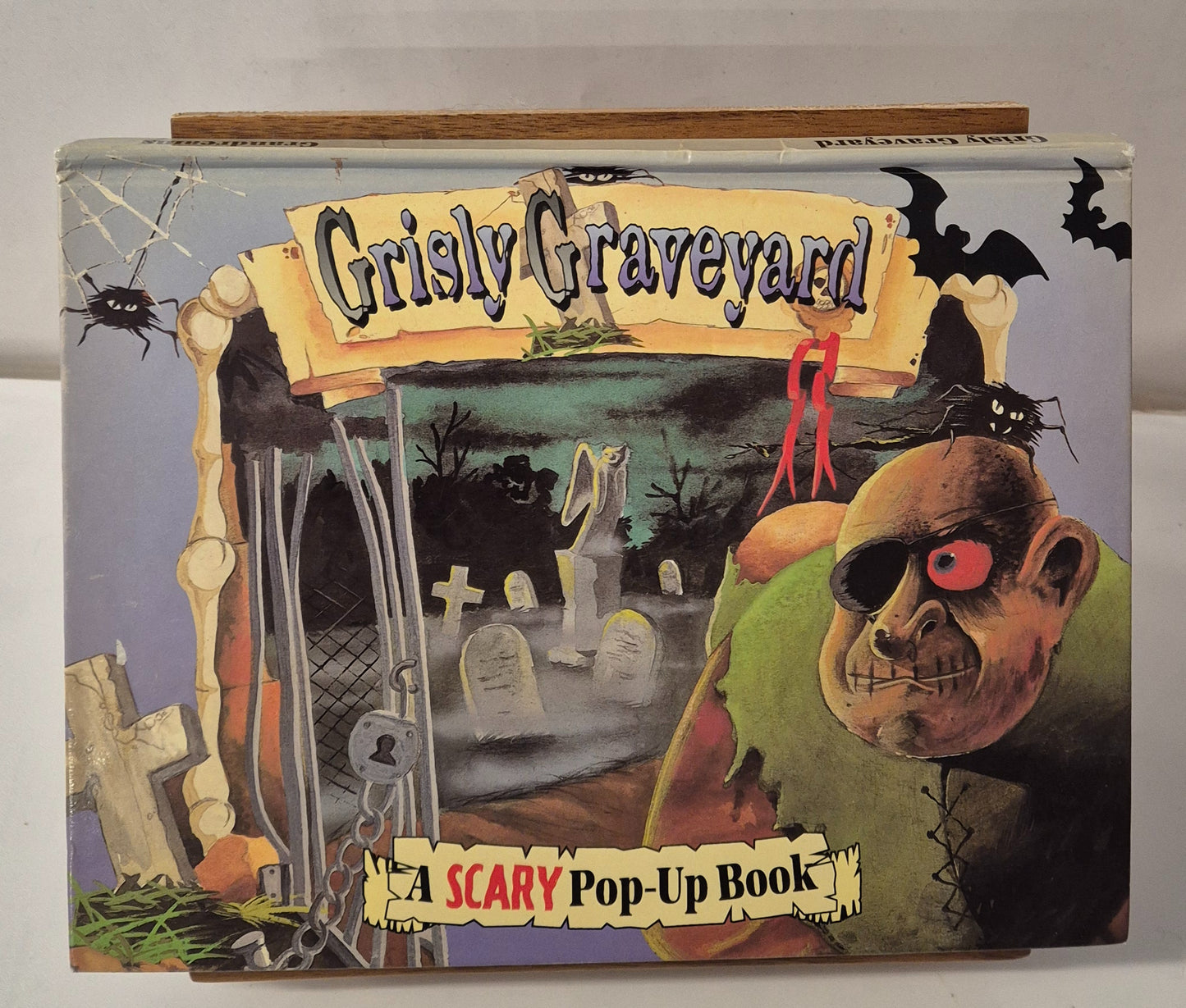 Grisly Graveyard: A Scary Pop-Up Book