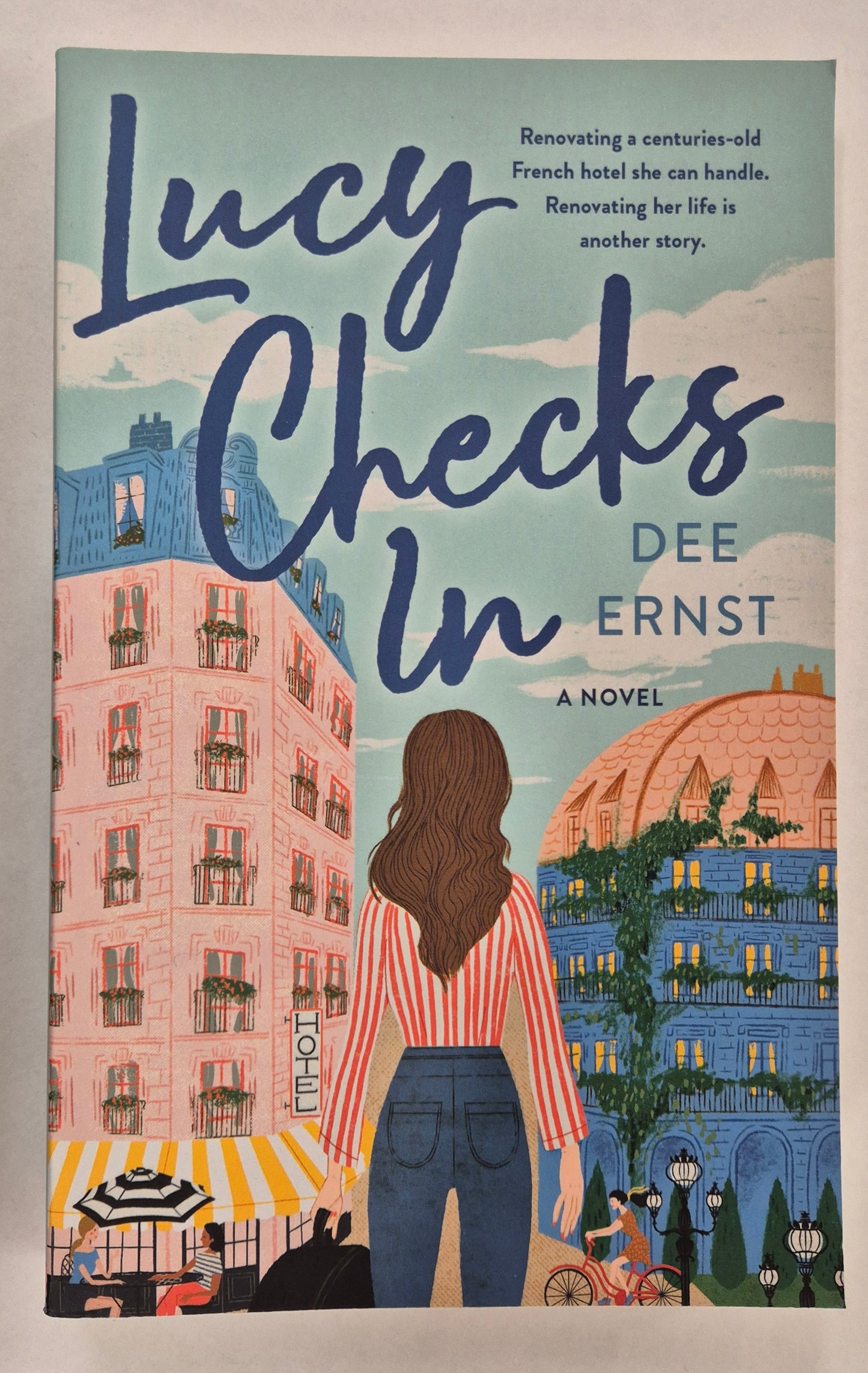 Lucy Checks In by Dee Ernst