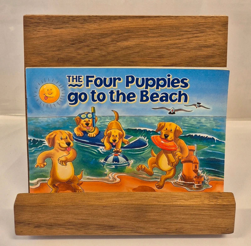 The Four Puppies go to the Beach by Bruce Atherton