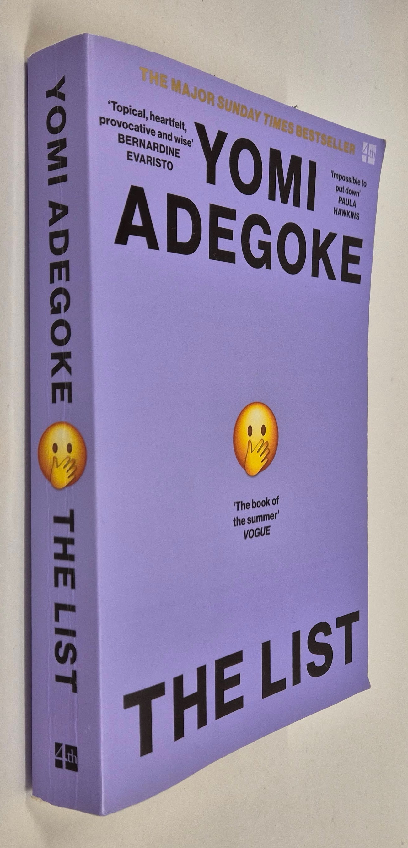 Book titled 'The List' by Yomi Adegoke. A contemporary fiction novel. Purple with an emoji cover