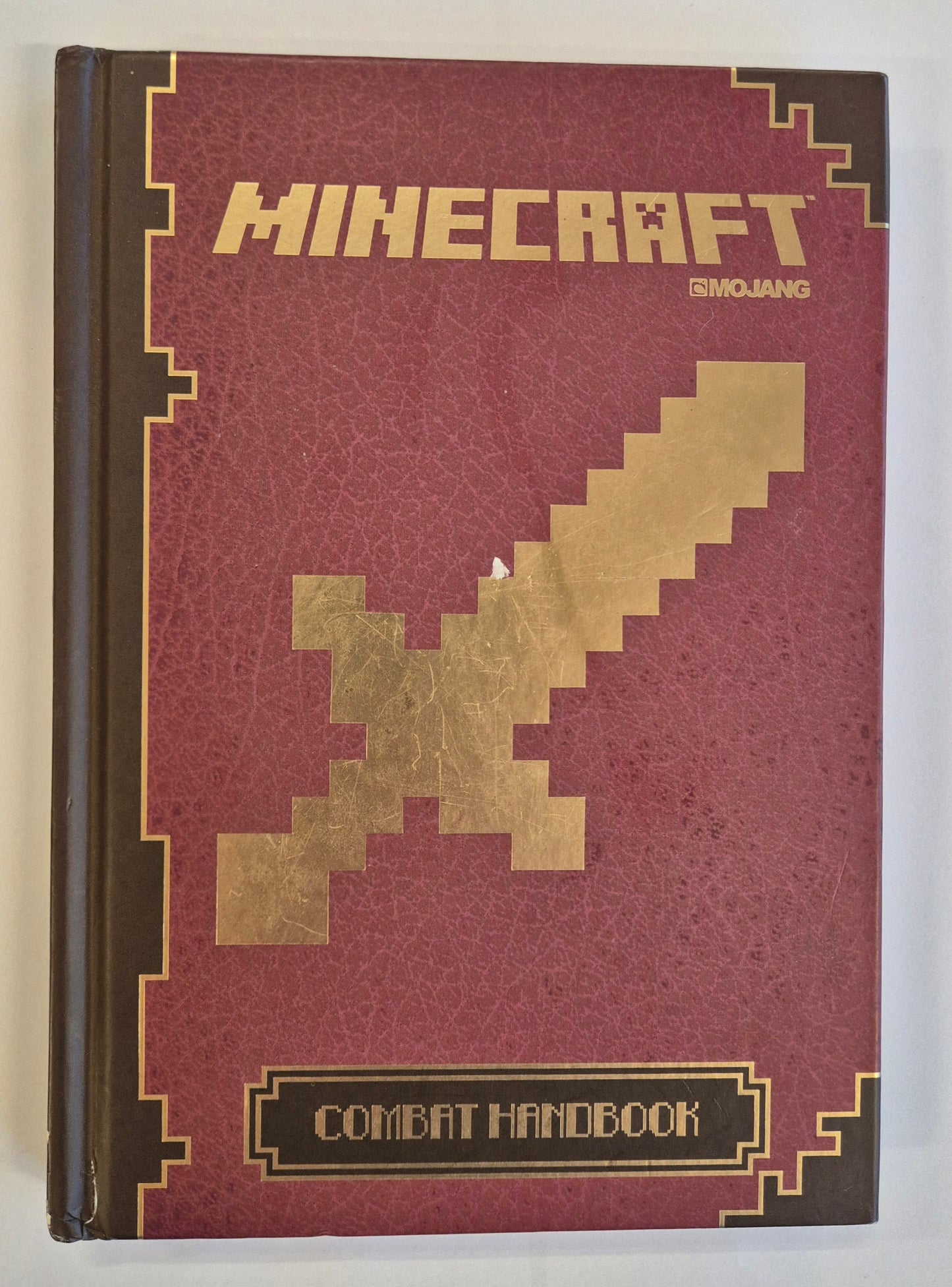 Minecraft: Combat Handbook by Stephanie Milton