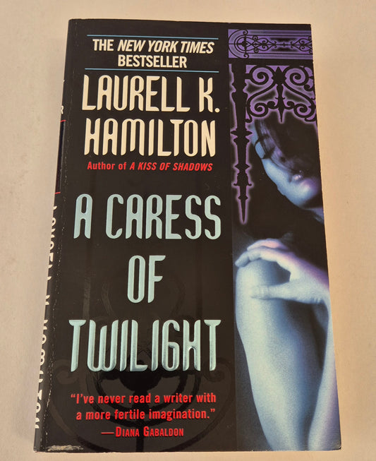 A Caress of Twilight (Merry Gentry #2) by Laurell K. Hamilton
