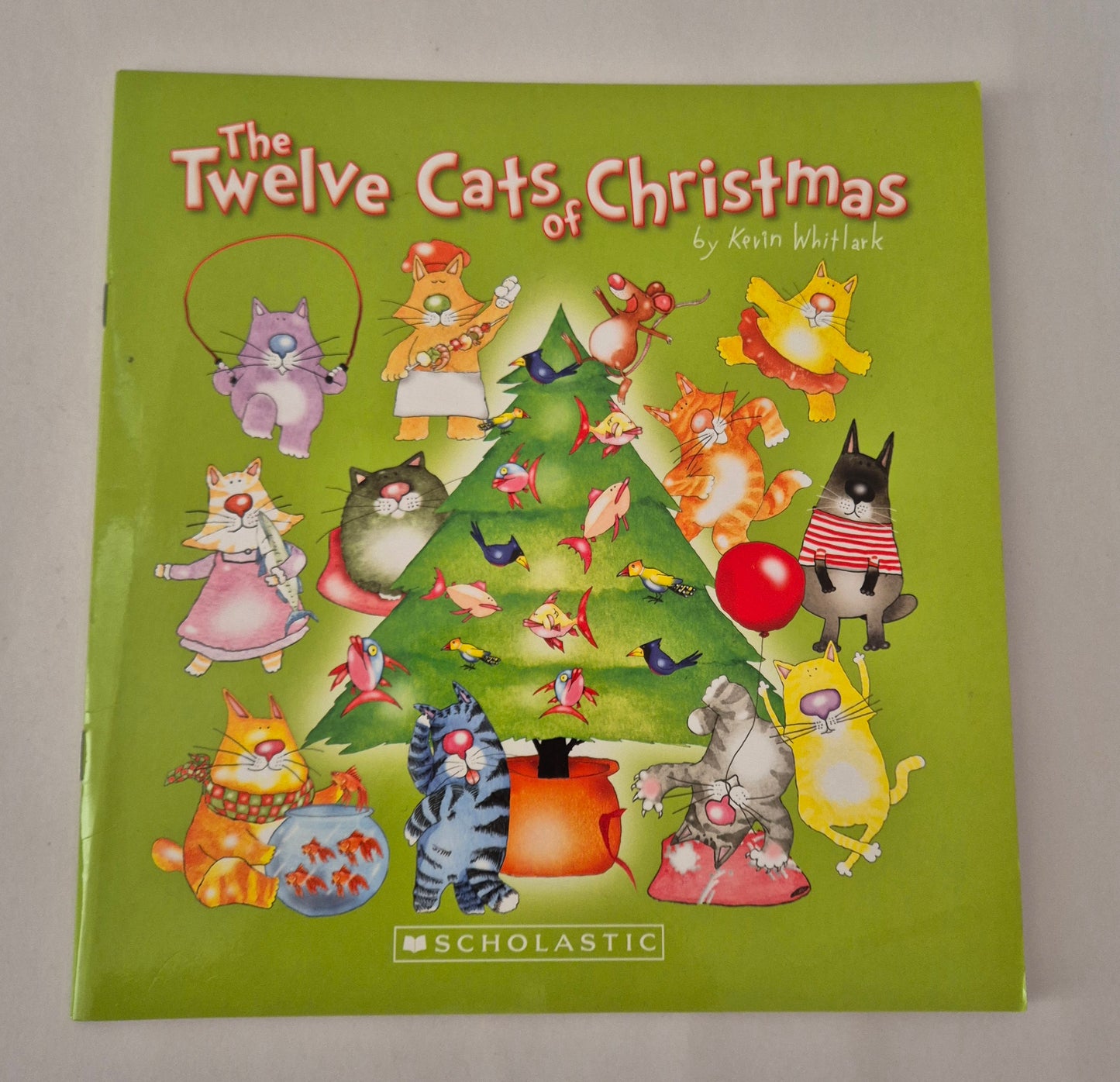 The Twelve Cats of Christmas by Kevin Whitlark