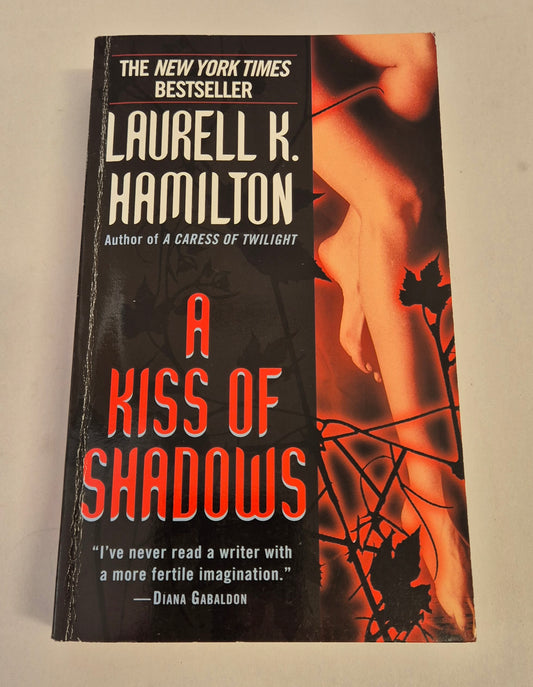 A Kiss of Shadows (Merry Gentry #1) by Laurell K. Hamilton